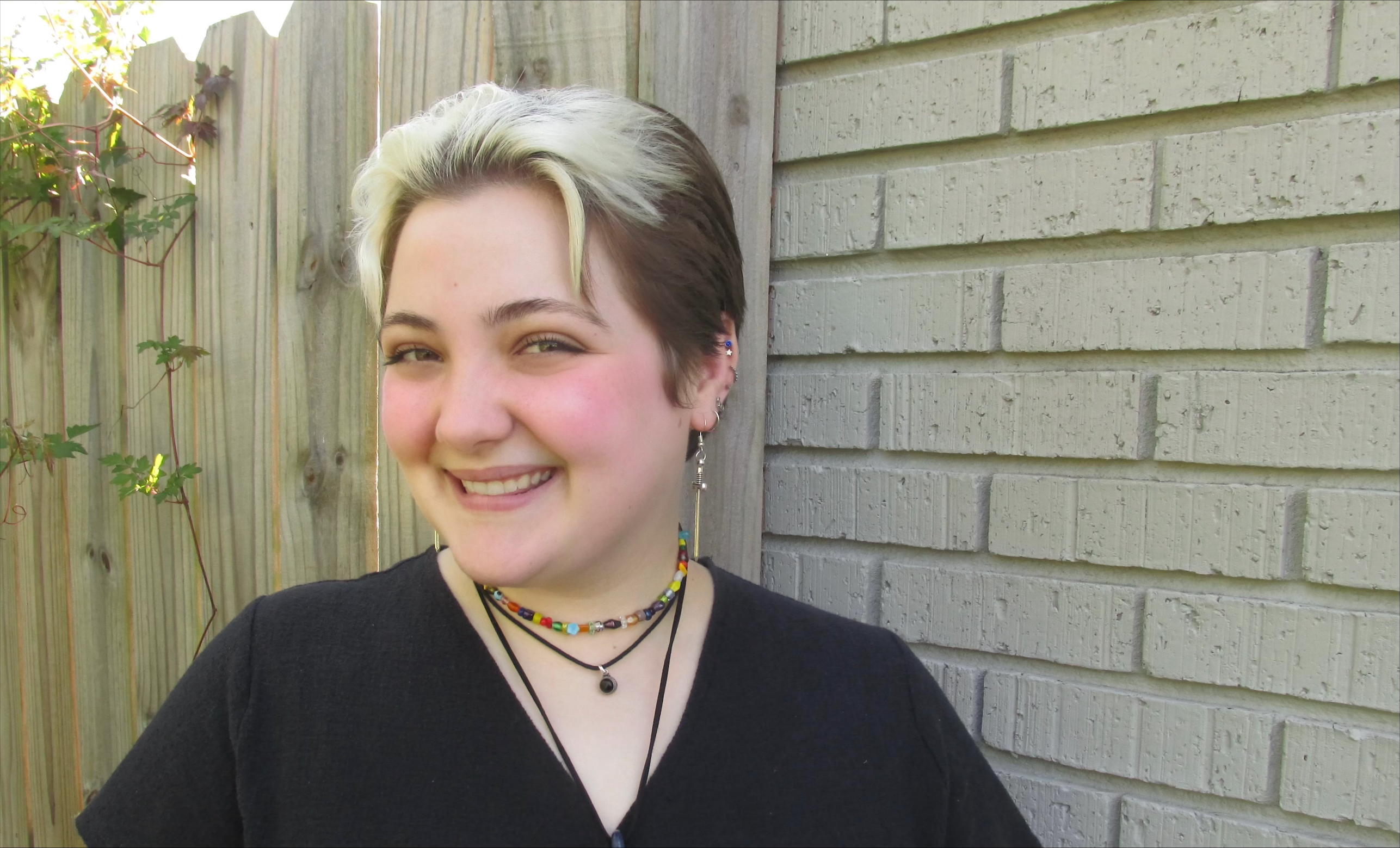 B. Twilbeck, Communications & Social Media Manager 
