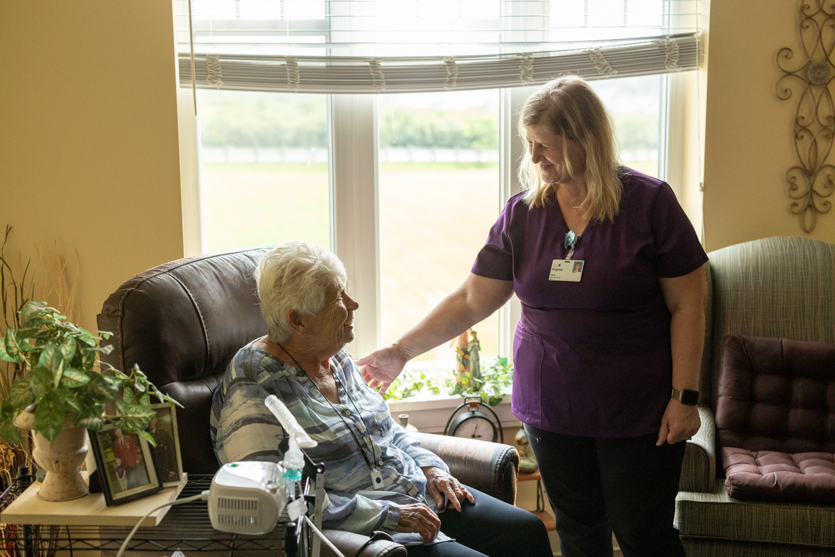 Photo of a nurse and elderly patient