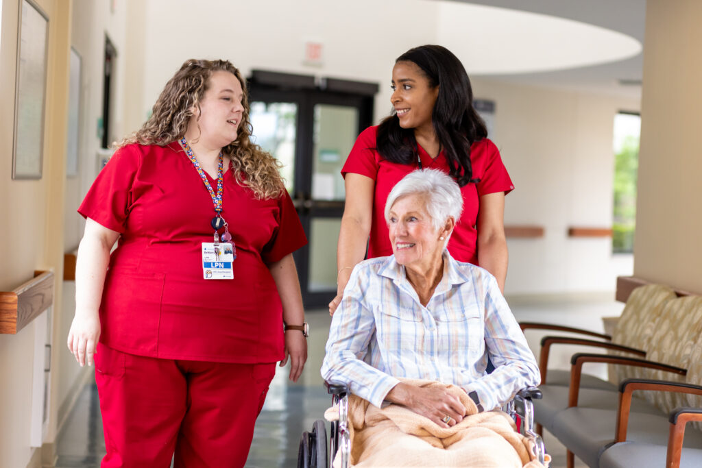 Brittany Garwick, LPN with resident SKH